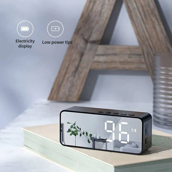 "Mirrored Alarm Clock Speaker with Bluetooth and FM Radio"