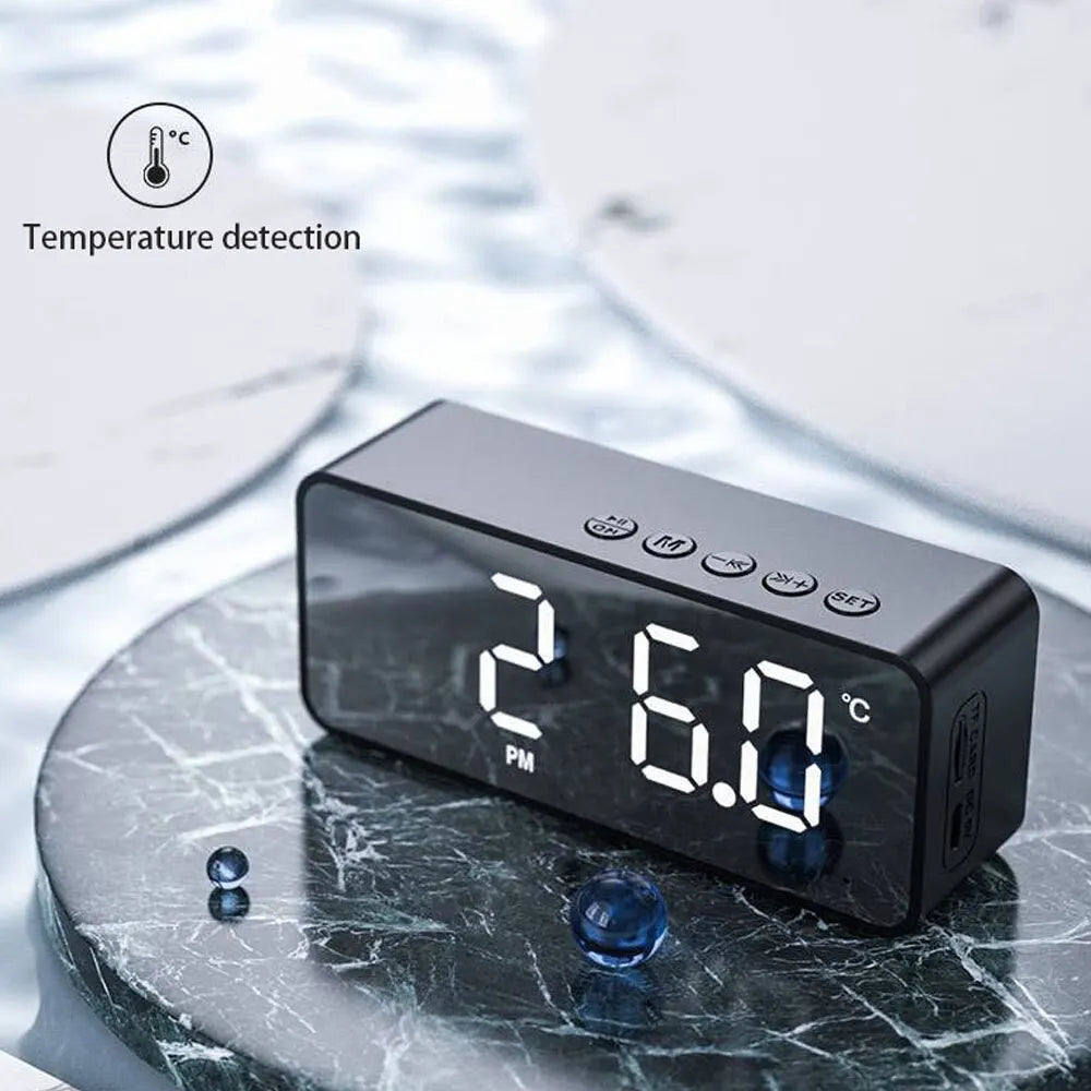 "Mirrored Alarm Clock Speaker with Bluetooth and FM Radio"